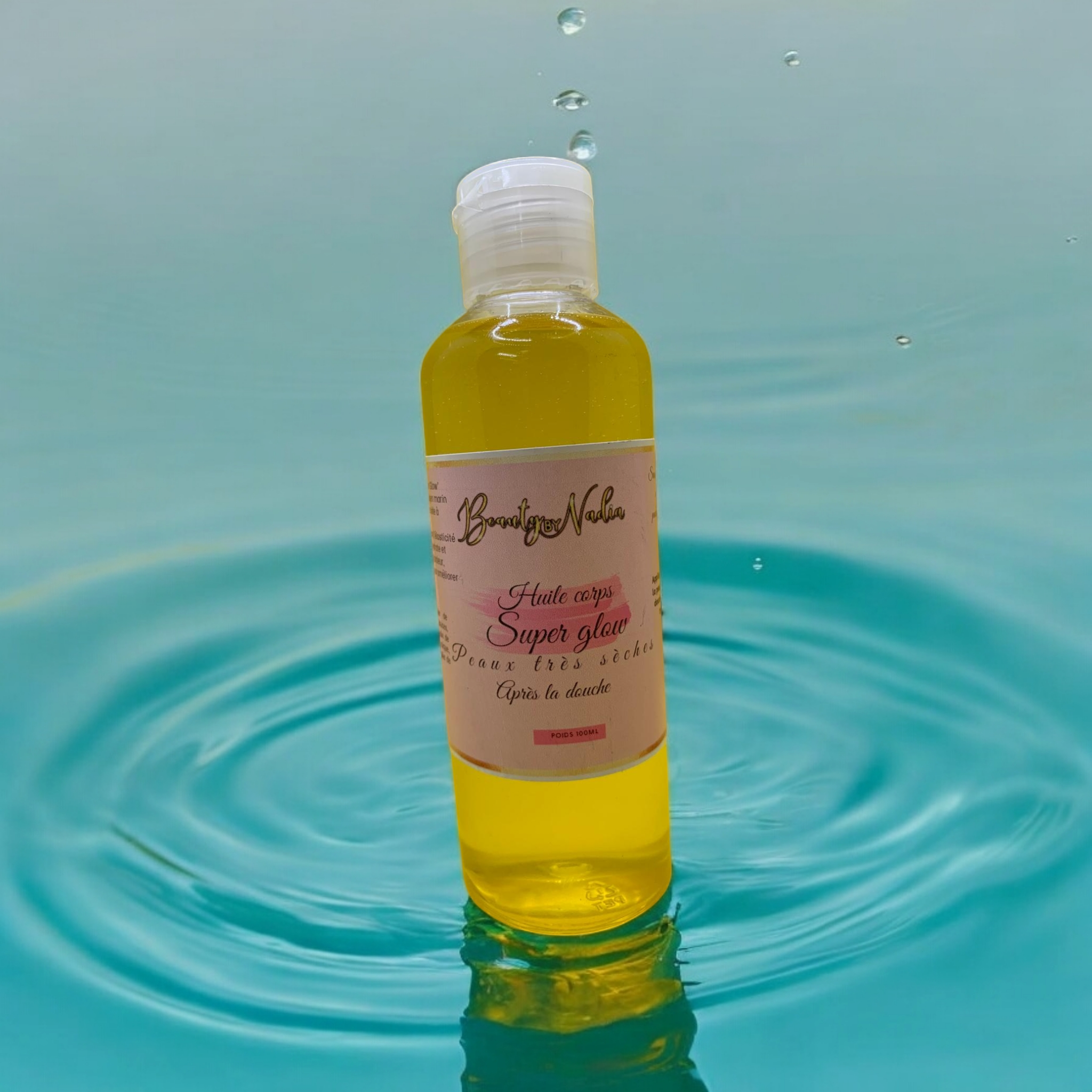 Huile corps 'Super glow' après la douche